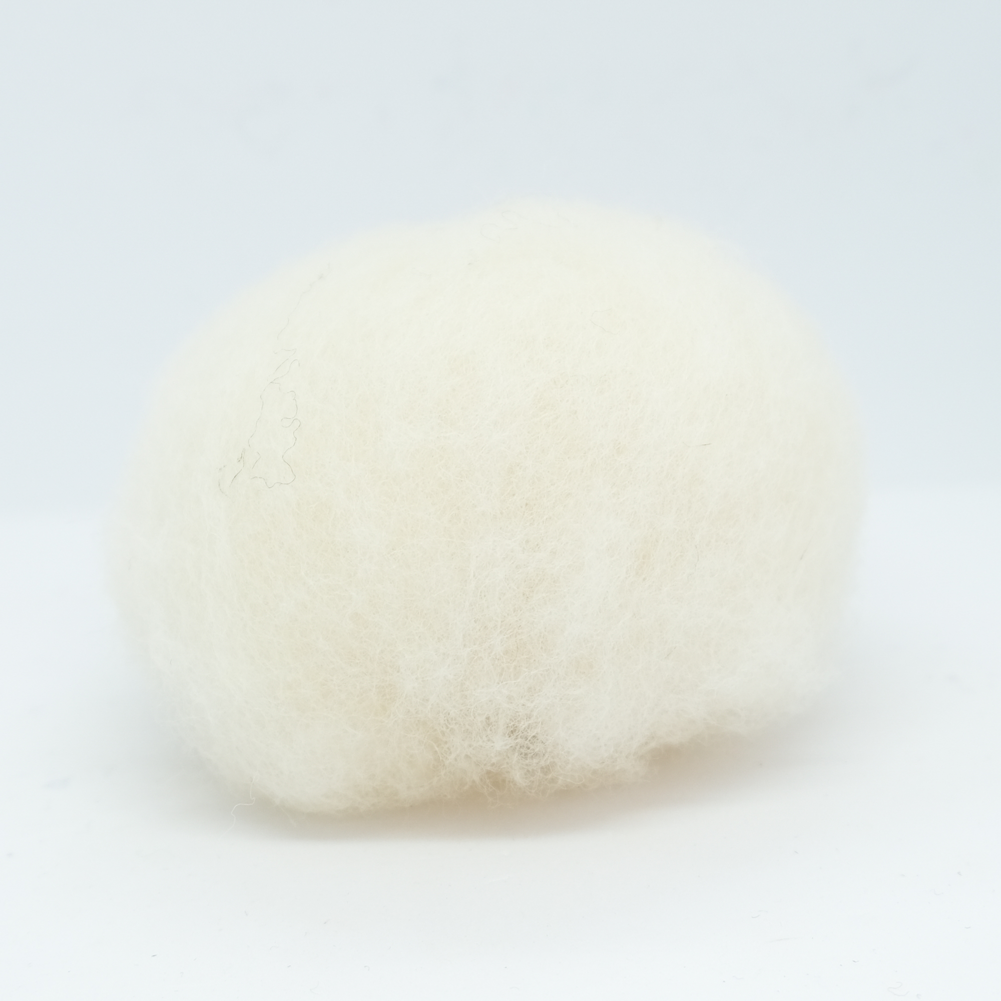 Kardet ull, vasket hvit