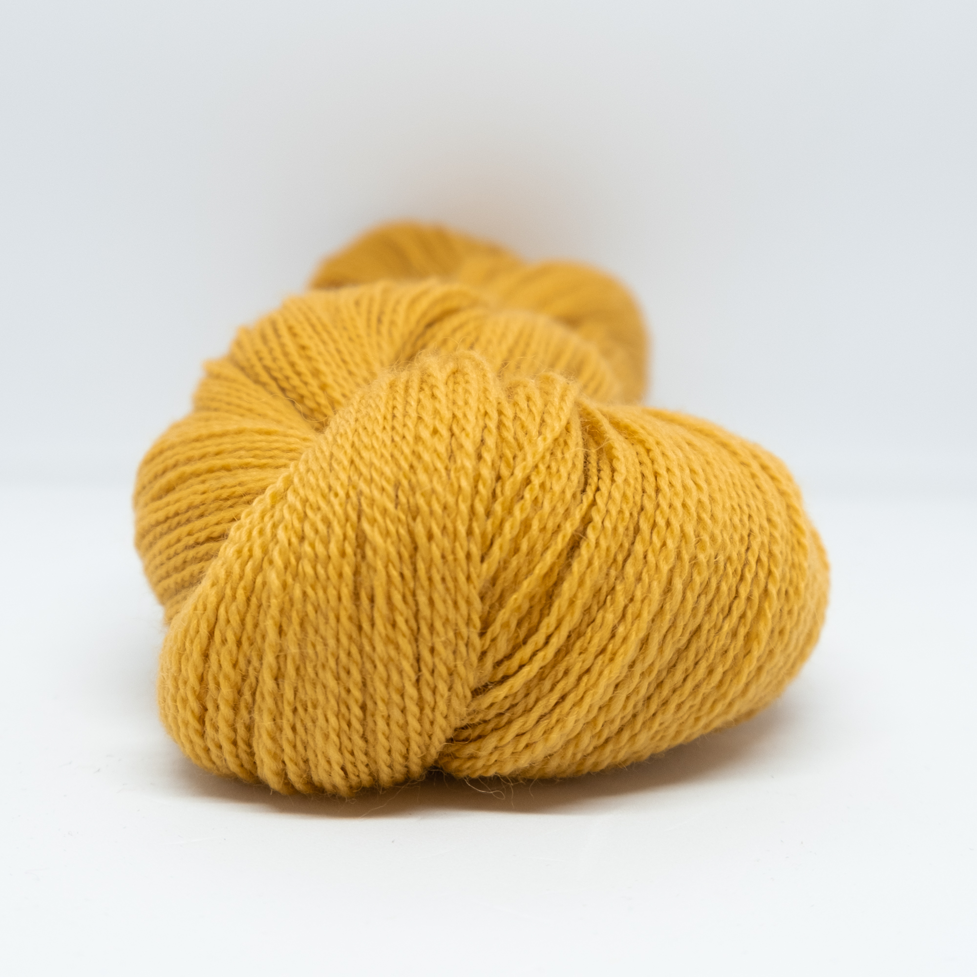 Huldra kamgarn 8,5/2, okergul (100 g hesper)