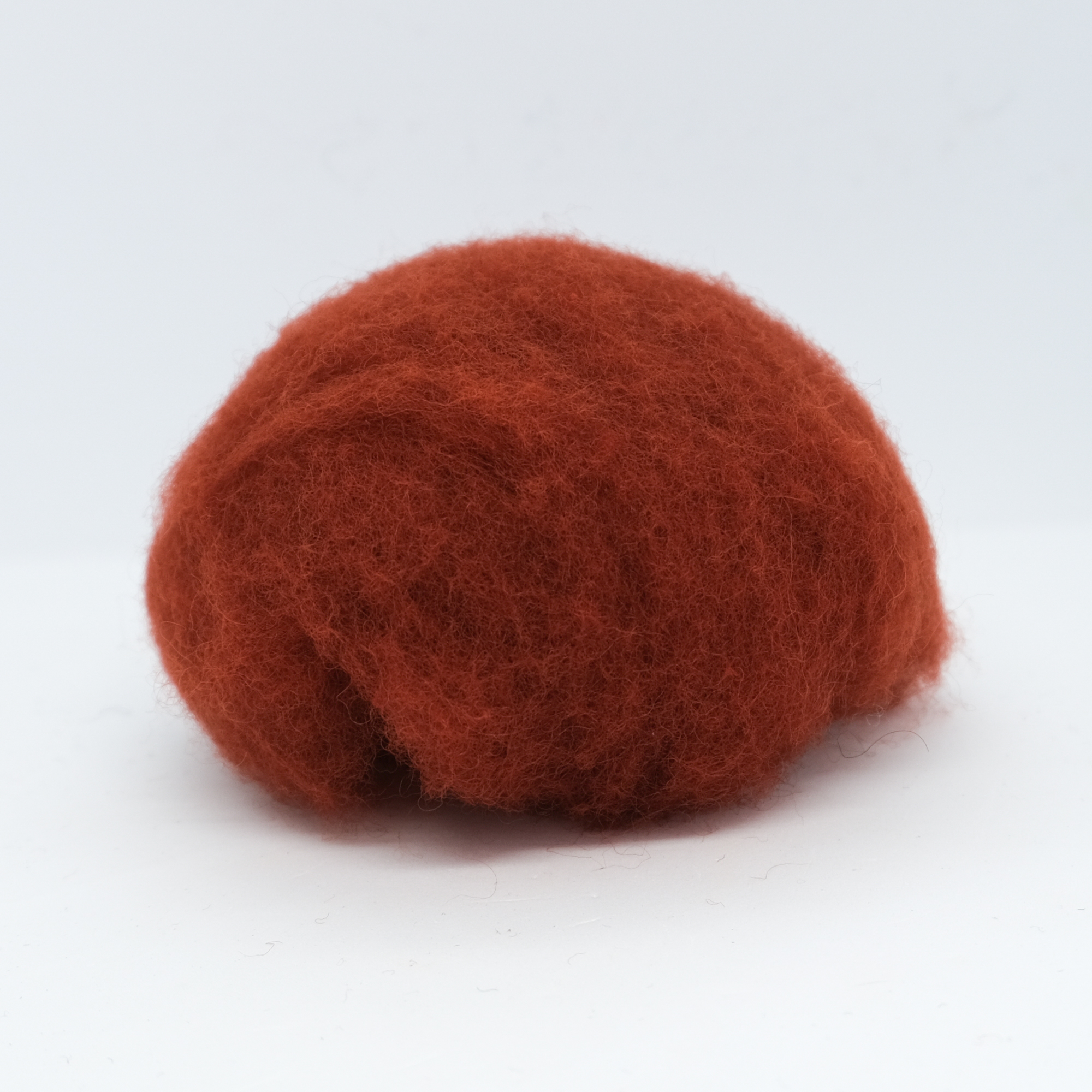 Kardet ull, rødbrun